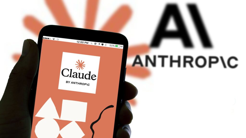 SPAIN - 2026/02/04: In this photo illustration, the logo of Anthropic's AI chatbot Claude is displayed on a smartphone, with the Anthropic logo visible in the background. (Photo Illustration by Davide Bonaldo/SOPA Images/LightRocket via Getty Images)
